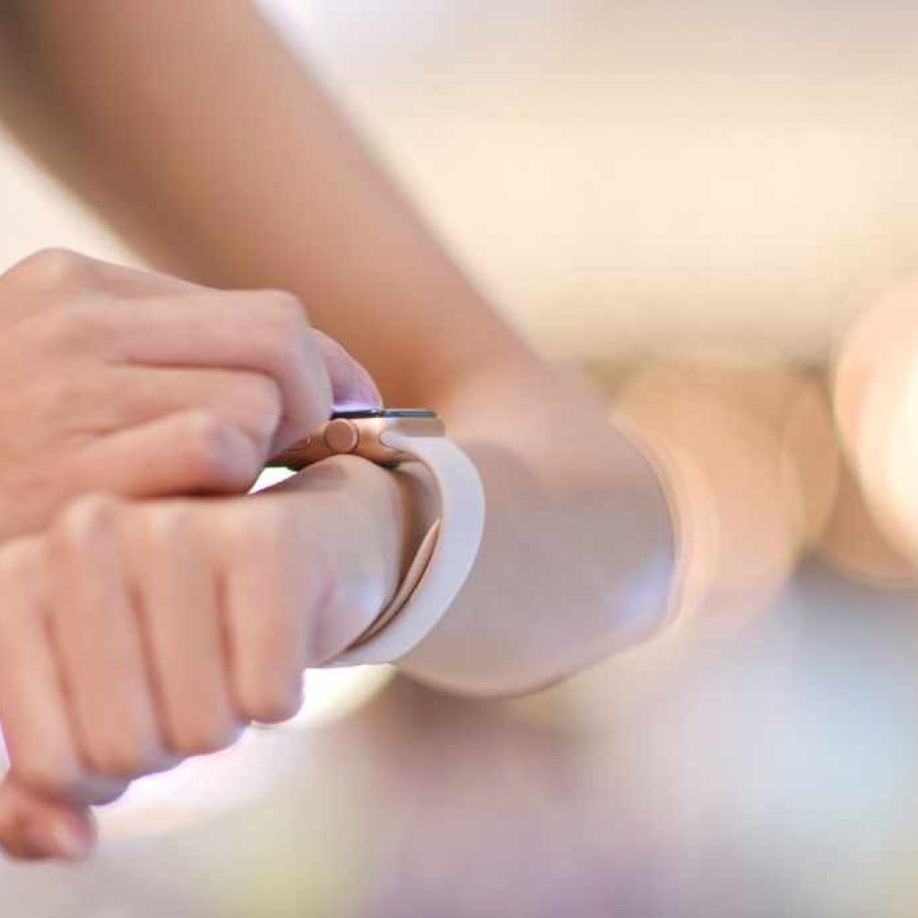 close up of apple watch on woman's arm