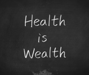 black background white text that says Health is Wealth