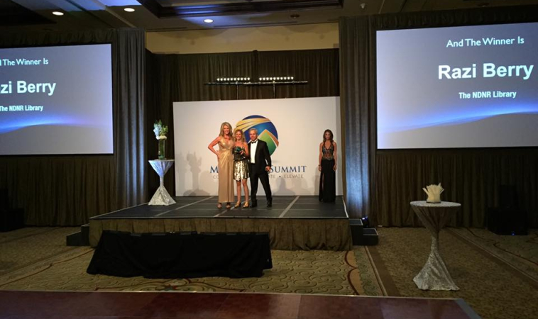 Razi Berry Publisher of NDNR & NaturalPath Accepts Impact Award at the Mindshare Summit