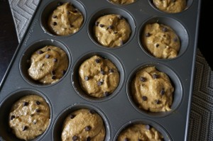Scoop muffins into pan